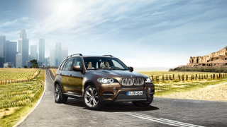 Illustration for article titled Aston Martin Gets A New Investor, BMW X5 Gets A Recall, And Unions Get Hit